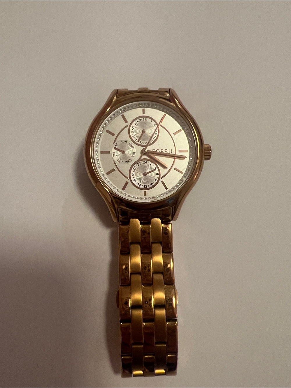 Fossil Woman’s Gold-Tone Bracelet Watch with White Dial